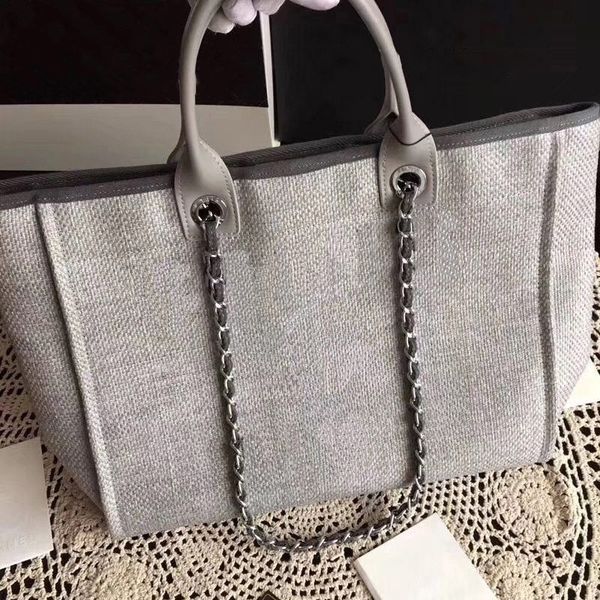 2019 new fashion classic chain beach bag's mummy bag handbags purse calf leather handle the original fabric pure cotton inner lining
2019 new fashion classic chain beach bag's mummy bag handbags purse calf leather handle the original fabric pure cotton inner lining