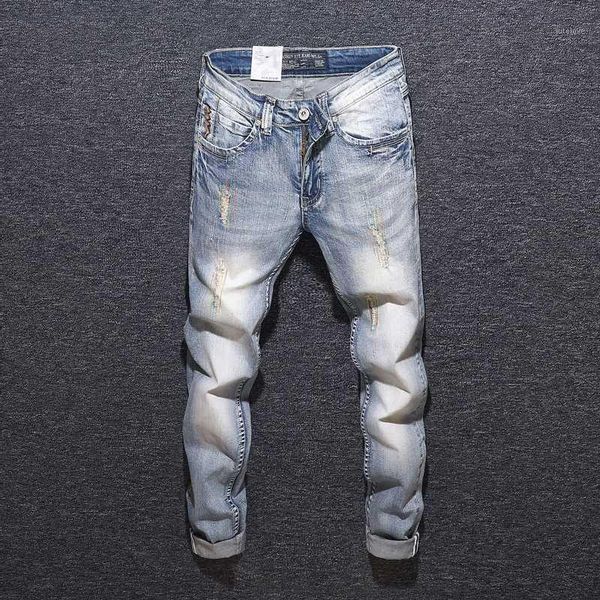 italian style fashion men jeans light blue slim fit ripped jeans men embroidery denim hip hop pants vintage designer homme1
italian style fashion men jeans light blue slim fit ripped jeans men embroidery denim hip hop pants vintage designer homme1
