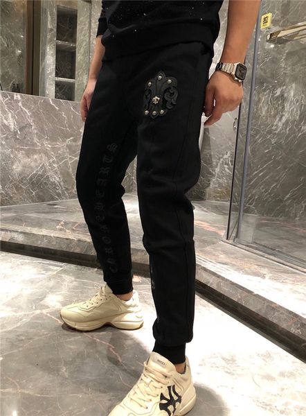 ins20 autumn and winter croxin horseshoe badge sanskrit print men's small foot nine point sports casual pants, Black
ins20 autumn and winter croxin horseshoe badge sanskrit print men's small foot nine point sports casual pants, Black