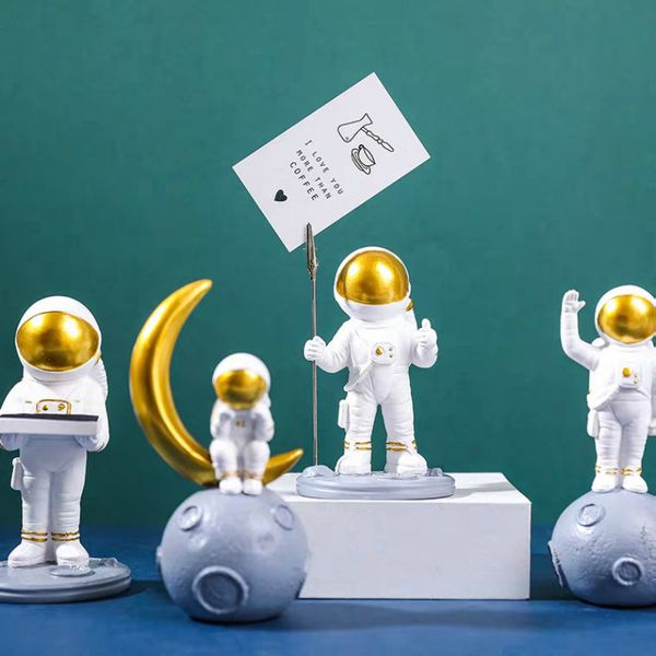 astronaut spaceman note holder creative deskwatch stand mobile phone bracket modern home decoration accessories
astronaut spaceman note holder creative deskwatch stand mobile phone bracket modern home decoration accessories