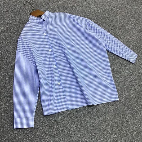 women new loose cotton shirt white and blue plaid slung long sleeve asymmetrical blouse1
women new loose cotton shirt white and blue plaid slung long sleeve asymmetrical blouse1