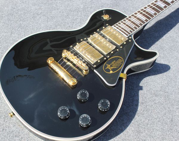 electric guitar body mahogany rosewood fingerboard white binding and black pickguard 3 pickups golden hardware
electric guitar body mahogany rosewood fingerboard white binding and black pickguard 3 pickups golden hardware
