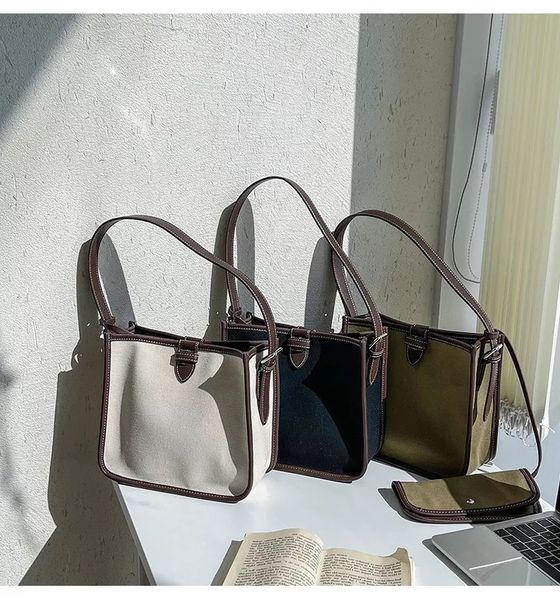 simple canvas wide strap casual korean light color contrast new literature and art portable tote shoulder bag 
simple canvas wide strap casual korean light color contrast new literature and art portable tote shoulder bag