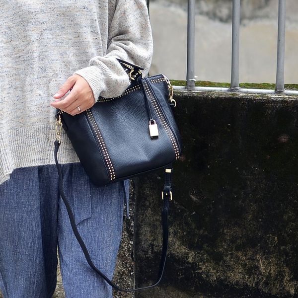rivet fashion hand-held single shoulder oblique straddle bag multi-layer texture lady bag c0121
rivet fashion hand-held single shoulder oblique straddle bag multi-layer texture lady bag c0121