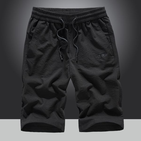 men's youth large shorts elastic loose summer new casual beach 5-point pants, White;black
men's youth large shorts elastic loose summer new casual beach 5-point pants, White;black