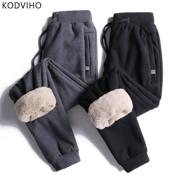men winter plus size pants casual streetwear solid trousers mens elastic lamb fur fleece sweatpants thermal warm man brand cloth 201128, Black
men winter plus size pants casual streetwear solid trousers mens elastic lamb fur fleece sweatpants thermal warm man brand cloth 201128, Black