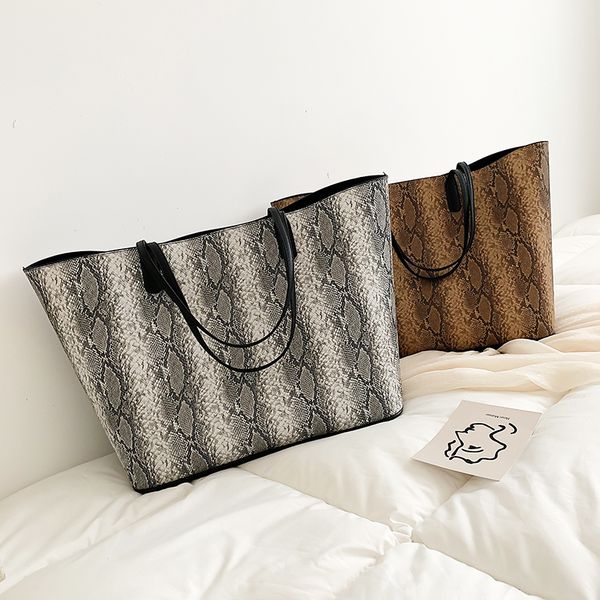 2020 european and american fashion simple big-style bag women's designer handbag high-quality pu leather shoulder bag qq556
2020 european and american fashion simple big-style bag women's designer handbag high-quality pu leather shoulder bag qq556