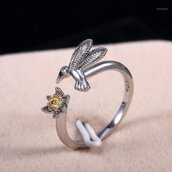 cluster rings the humming bird flower ring women's girl's animal jewelry adjustable wrap gift1, Golden;silver
cluster rings the humming bird flower ring women's girl's animal jewelry adjustable wrap gift1, Golden;silver