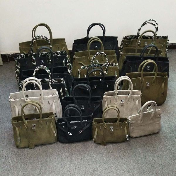 new fashion classic creative individual handicraft army green canvas bag tote handbag
new fashion classic creative individual handicraft army green canvas bag tote handbag