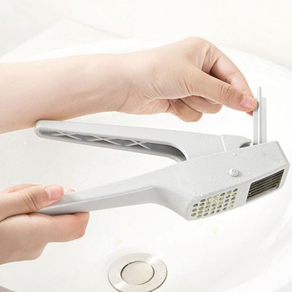 kitchen manual garlic press plastic vegetable crusher ginger squeezer masher handheld ginger garlic mincer kitchen tools
kitchen manual garlic press plastic vegetable crusher ginger squeezer masher handheld ginger garlic mincer kitchen tools