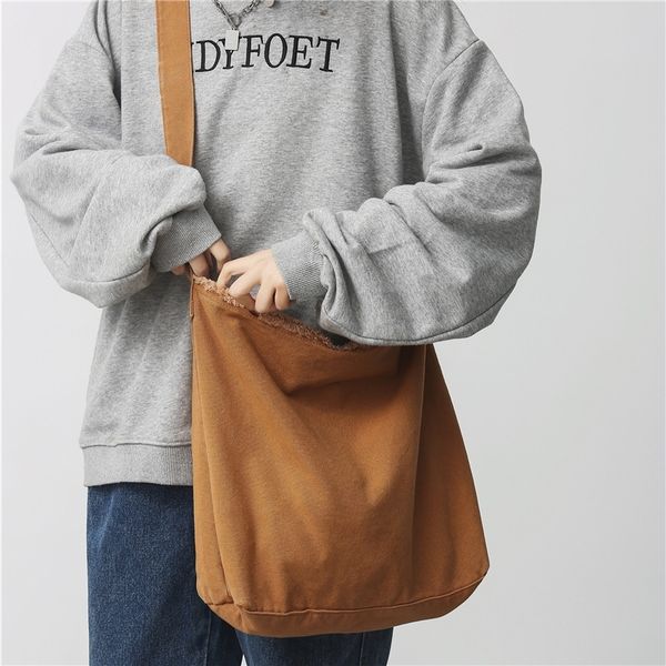 crossbody simple canvas single-shoulder large capacity personalized raw edge bucket bag woman 220302
crossbody simple canvas single-shoulder large capacity personalized raw edge bucket bag woman 220302