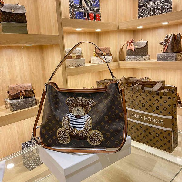 evening bags autumn and winter women's new rhinestone bear shoulder large capacity handbag commuter tote bag
evening bags autumn and winter women's new rhinestone bear shoulder large capacity handbag commuter tote bag