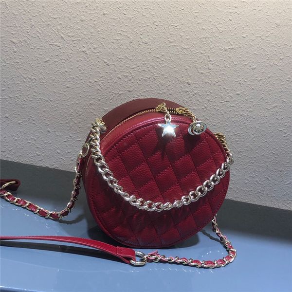 autumn and winter lingge net red pure leather women's xiangfeng messenger small round cake chain bag
autumn and winter lingge net red pure leather women's xiangfeng messenger small round cake chain bag