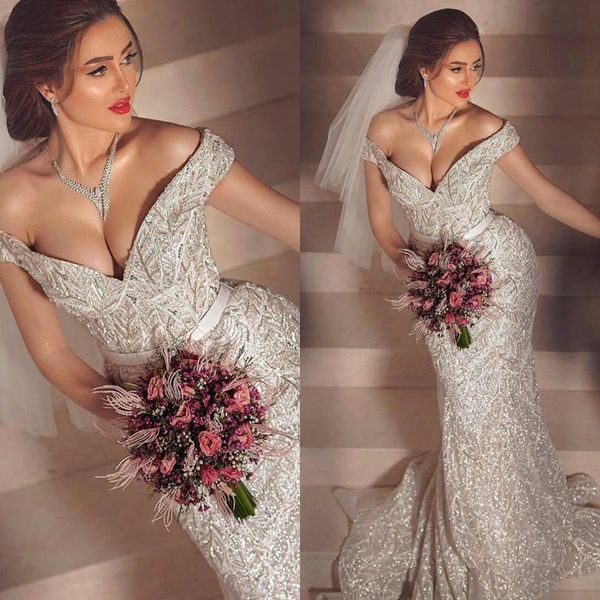 2021 shiny sequined wedding dresses plus size off shoulder lace bridal gowns arabic mermaid robes de mariée, White
2021 shiny sequined wedding dresses plus size off shoulder lace bridal gowns arabic mermaid robes de mariée, White