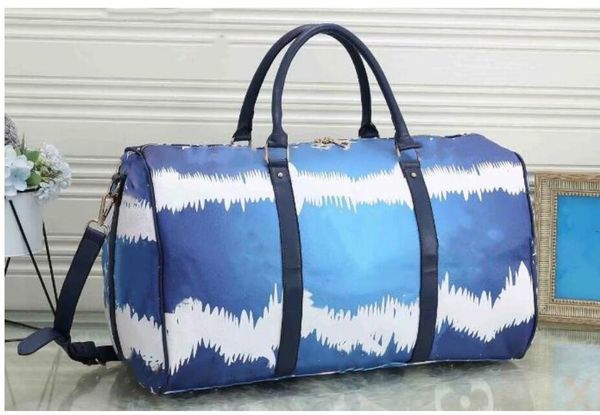 55cm large capacity women travel bags sale quality women men shoulder duffel bags carry on luggage bottom rivets with lock head
55cm large capacity women travel bags sale quality women men shoulder duffel bags carry on luggage bottom rivets with lock head