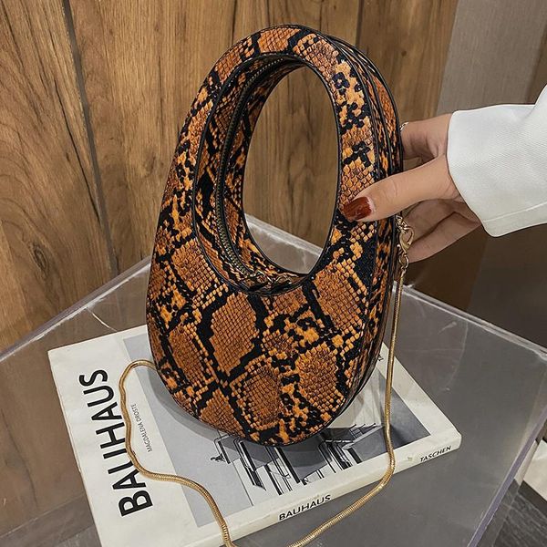 fashion female small hand bag circular serpentine print women's designer handbag chain shoulder messenger bag
fashion female small hand bag circular serpentine print women's designer handbag chain shoulder messenger bag