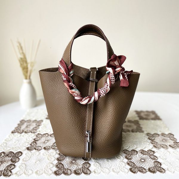 spring and summer new vegetable basket lychee grain head bucket leather one shoulder portable women's bag
spring and summer new vegetable basket lychee grain head bucket leather one shoulder portable women's bag