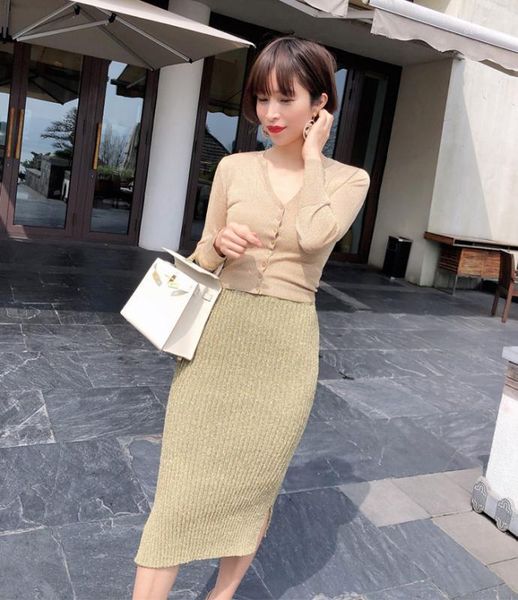 women stylish high waist golden knitted midi skirt with side vents and lurex detail1, Black
women stylish high waist golden knitted midi skirt with side vents and lurex detail1, Black