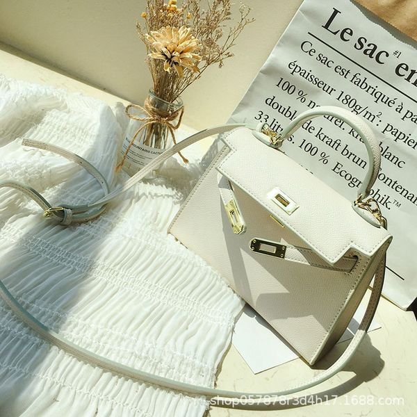 leather women's spring and summer new versatile second generation mini white kelly fashion chain one shoulder messenger bag
leather women's spring and summer new versatile second generation mini white kelly fashion chain one shoulder messenger bag