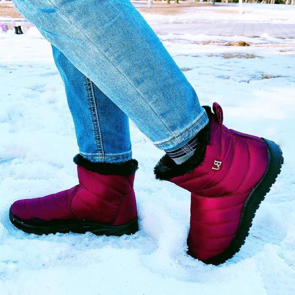 snow boots women shoes warm plush fur ankle boots winter female slip on flat casual shoes 2020 waterproof ultralight footwear1, Black 
snow boots women shoes warm plush fur ankle boots winter female slip on flat casual shoes 2020 waterproof ultralight footwear1, Black