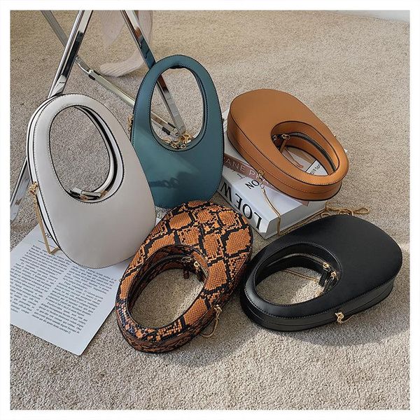 luxury handbags oval women bags snake shoulder crossbody bags design egg-shaped clutch bag leather female serpentine evening bag
luxury handbags oval women bags snake shoulder crossbody bags design egg-shaped clutch bag leather female serpentine evening bag