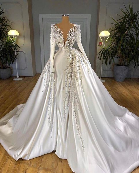 luxury pearls mermaid wedding dresses with overskirt beaded v neck satin long sleeve chapel wedding gowns elegant modern arabic dubai bridal, White
luxury pearls mermaid wedding dresses with overskirt beaded v neck satin long sleeve chapel wedding gowns elegant modern arabic dubai bridal, White