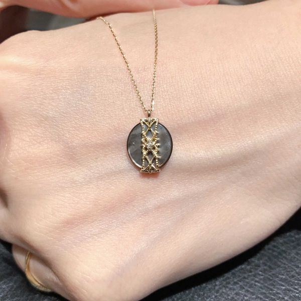 japanese light luxury 925 sterling silver pendant black shell double cut classic hollow pattern clavicle necklace
japanese light luxury 925 sterling silver pendant black shell double cut classic hollow pattern clavicle necklace