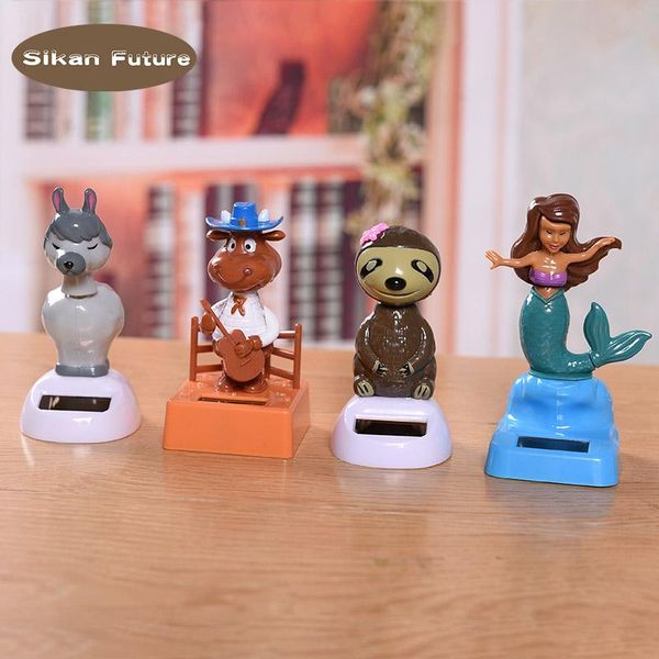 car dashboard toy ornaments abs material creative solar new automobile cartoon mermaid shaking head doll decoration accessories
car dashboard toy ornaments abs material creative solar new automobile cartoon mermaid shaking head doll decoration accessories