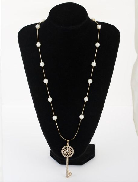 2020 new fashion rhinestone sunflower key pendant pearls long chain necklace women's wild simple sweater chain choker, Silver
2020 new fashion rhinestone sunflower key pendant pearls long chain necklace women's wild simple sweater chain choker, Silver