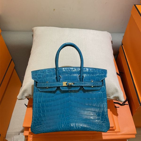 25cm crocodile totes real shinny alligator skin blue color luxury bag brand handbag fully handmade quality wax line stitching wholesale
25cm crocodile totes real shinny alligator skin blue color luxury bag brand handbag fully handmade quality wax line stitching wholesale