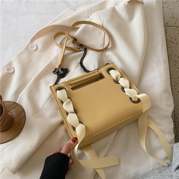 solid color square tote bag 2020 fashion new high-quality leather women's designer handbag travel ribbon shoulder messenger bag 
solid color square tote bag 2020 fashion new high-quality leather women's designer handbag travel ribbon shoulder messenger bag