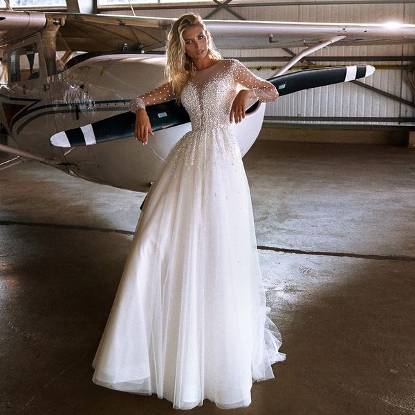 2021 new sparkling custom long sleeve jewel neck pearls illusion back sweep train bridal es wedding gown y67c, White
2021 new sparkling custom long sleeve jewel neck pearls illusion back sweep train bridal es wedding gown y67c, White