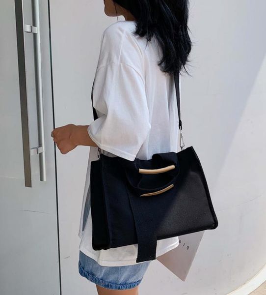 2021 new canvas bag shoulder bag large capacity student tote portable qw 21012713dq
2021 new canvas bag shoulder bag large capacity student tote portable qw 21012713dq