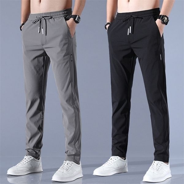 men's ice silk trousers solid color mid-waist loose breathable straight-leg casual pants thin quick-drying sports pants 220311, Black
men's ice silk trousers solid color mid-waist loose breathable straight-leg casual pants thin quick-drying sports pants 220311, Black
