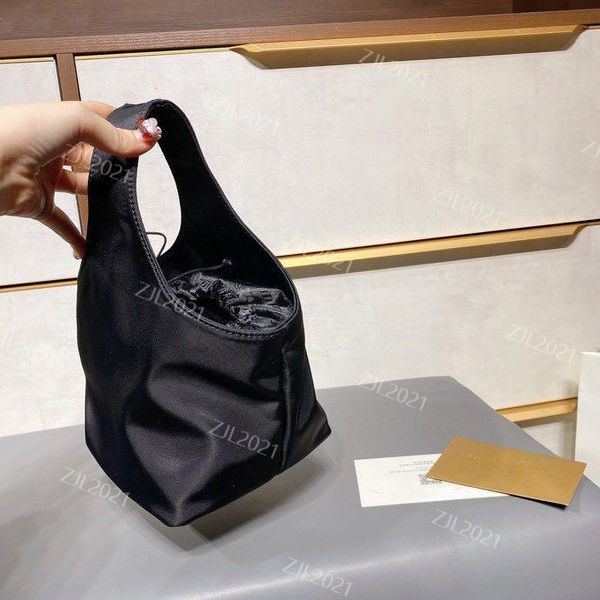 totes luxurys designers bags plain nylon the nylon handbag acts like a bucket handbags
totes luxurys designers bags plain nylon the nylon handbag acts like a bucket handbags