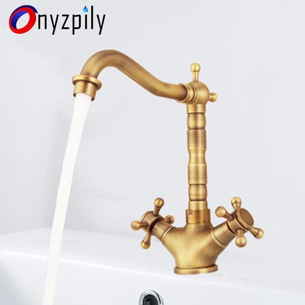 onyzpily kitchen sink faucet antique brass swivel dual handle bathroom mixer tap with and cold water deck mounted torneira1
onyzpily kitchen sink faucet antique brass swivel dual handle bathroom mixer tap with and cold water deck mounted torneira1