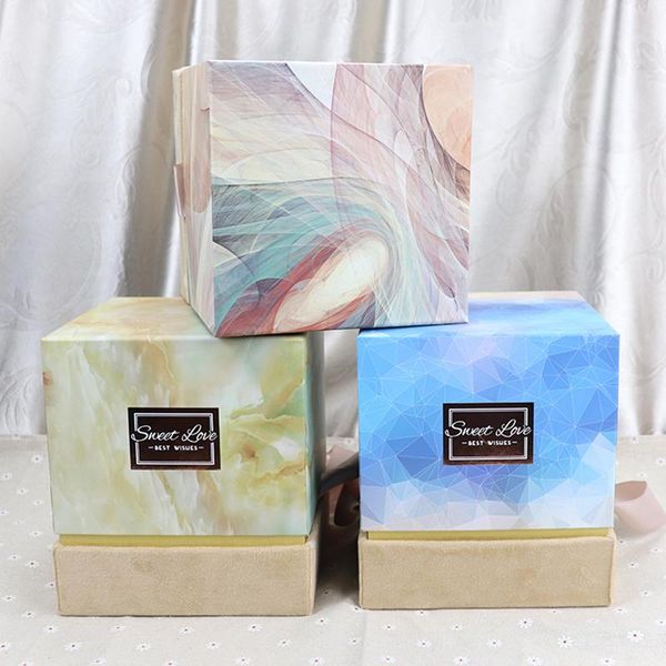 gift wrap traditional style cube shape paper box with complete cover lid holding flowers, chocolates, candies happy wedding's day
gift wrap traditional style cube shape paper box with complete cover lid holding flowers, chocolates, candies happy wedding's day