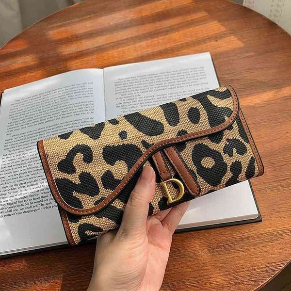 2022 factory outlet print simple fashion women's long three fold folding cloth zero large wallet ab1v
2022 factory outlet print simple fashion women's long three fold folding cloth zero large wallet ab1v