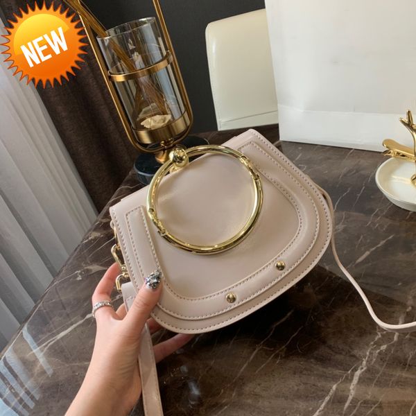 2022 genuine leather handbag bag metal ring package saddle nile handle bracelet bag female shoulder messenger crossbody
2022 genuine leather handbag bag metal ring package saddle nile handle bracelet bag female shoulder messenger crossbody