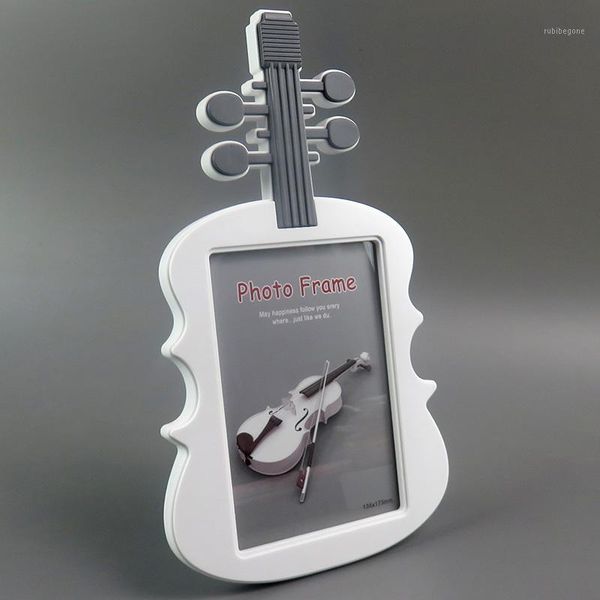 frames 7 inch cute carton violin shape baby po frame lovely kids picture holder display for home decor gift1
frames 7 inch cute carton violin shape baby po frame lovely kids picture holder display for home decor gift1