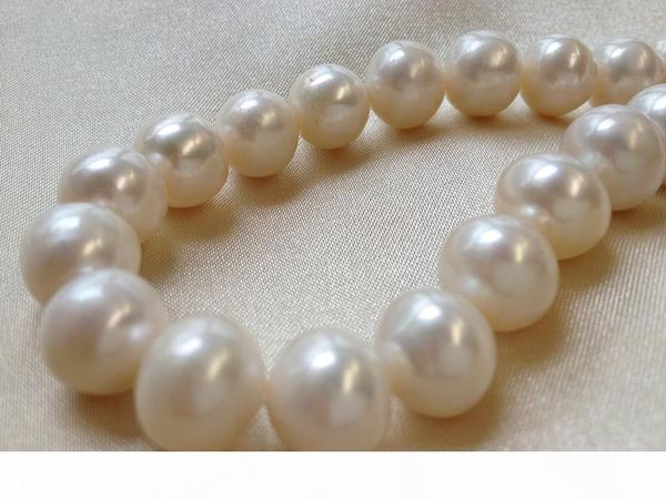 11-12mm white cultured freshwater pearls near round loose beads 15 inches
11-12mm white cultured freshwater pearls near round loose beads 15 inches