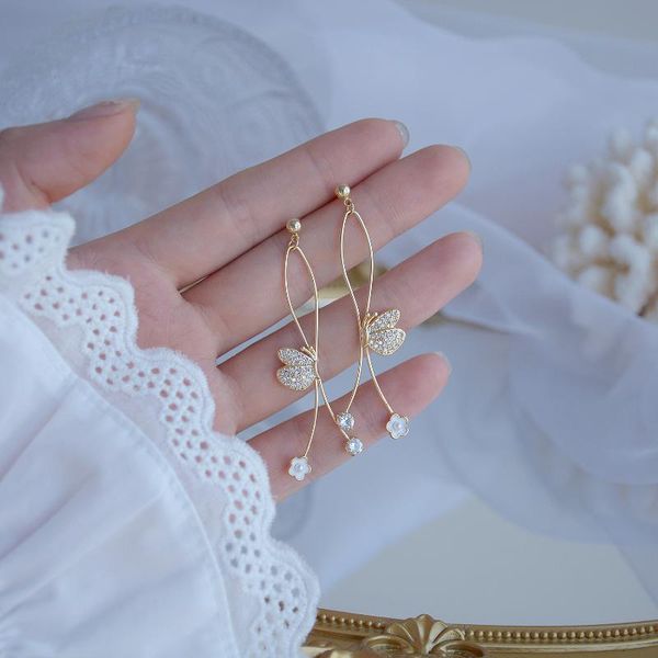 korea's new design fashion jewelry exquisite copper inlaid zircon butterfly twisted line metal earrings female long earrings, Silver
korea's new design fashion jewelry exquisite copper inlaid zircon butterfly twisted line metal earrings female long earrings, Silver