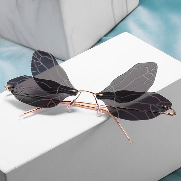 frameless triangle dragonfly flame sunglasses for men women personality 2020 personality bat sunglasses driving eyewear es1766, White;black
frameless triangle dragonfly flame sunglasses for men women personality 2020 personality bat sunglasses driving eyewear es1766, White;black