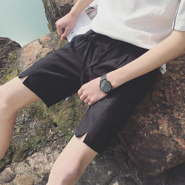 men's korean trousers trend casual small fresh suit shorts leg split capris, White;black
men's korean trousers trend casual small fresh suit shorts leg split capris, White;black