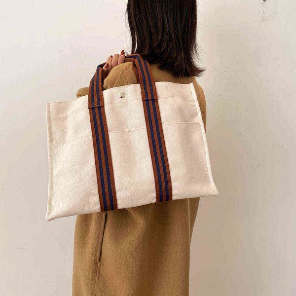 shopping bags summer large capacity vintage tote casual handbags fashion new lady portable solid soft women canvas shoulder bag 220307
shopping bags summer large capacity vintage tote casual handbags fashion new lady portable solid soft women canvas shoulder bag 220307