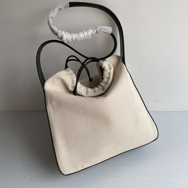 new sheepskin canvas handbag letter one shoulder armpit shopping king bag
new sheepskin canvas handbag letter one shoulder armpit shopping king bag