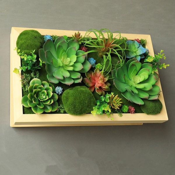home decoration green artificial plants succulents fake grass boxwood wooden frame decoration wall background
home decoration green artificial plants succulents fake grass boxwood wooden frame decoration wall background