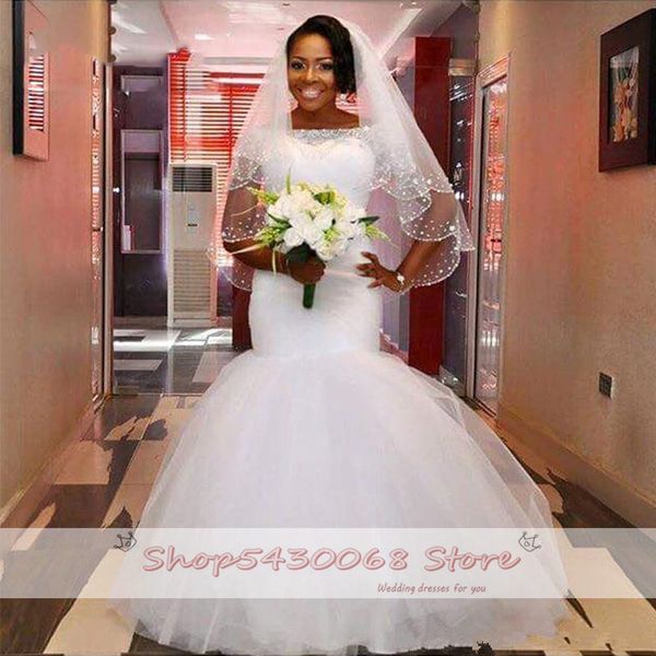 2021 new sheer neck illusion sleeve wedding gowns african lace applique scanning train plus size mermaid dressed as bride 4iso, White
2021 new sheer neck illusion sleeve wedding gowns african lace applique scanning train plus size mermaid dressed as bride 4iso, White