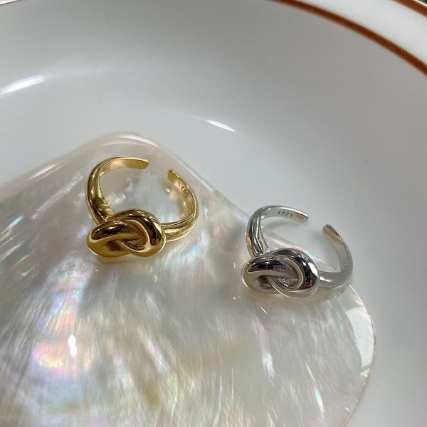 new minimalism 925 sterling silver handmade vintage jewelry american european designer knot adjustable rings in gold and rhodium colors
new minimalism 925 sterling silver handmade vintage jewelry american european designer knot adjustable rings in gold and rhodium colors