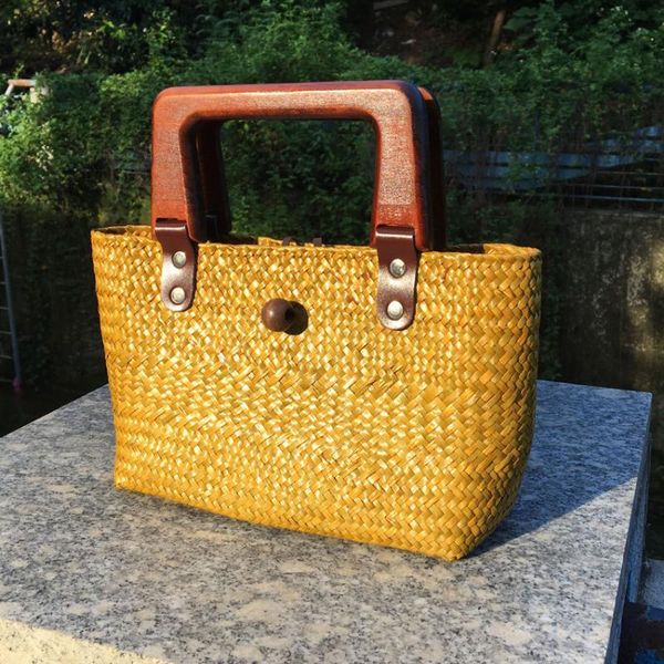 2020 new retro grass package thai version of the hand-woven hand-held women's grass package beach bag wholesale
2020 new retro grass package thai version of the hand-woven hand-held women's grass package beach bag wholesale